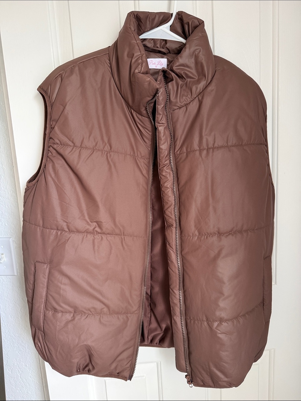 Never worn. Pink Lily Quilted Brown Oversized Puffer Vest. Size medium.